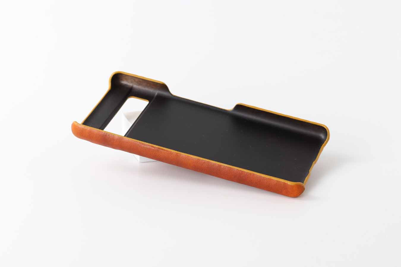 back of hard leather case for pixel 7a 7 and 7 pro shows button cut-outs for better assess