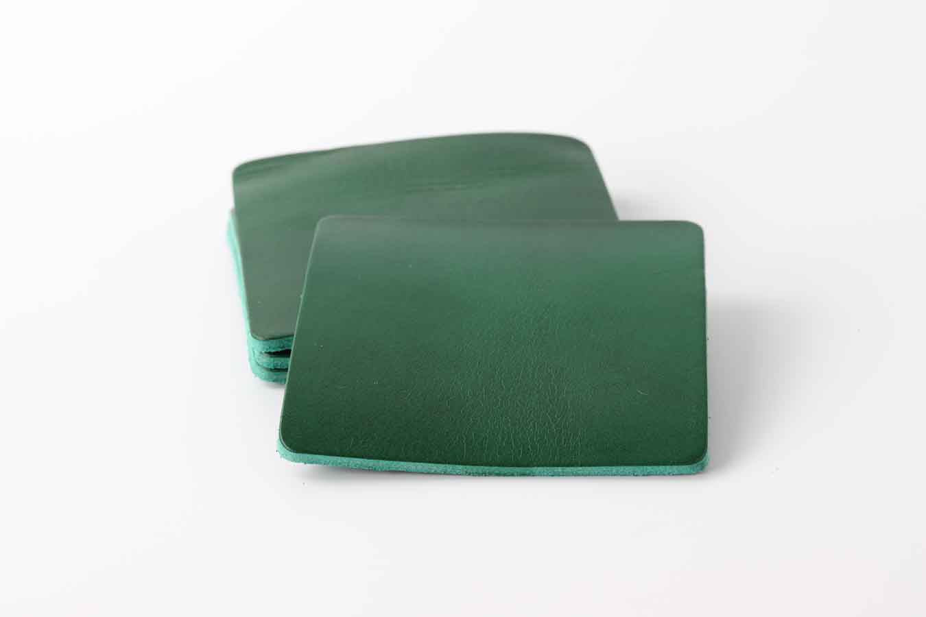green leather coaster set