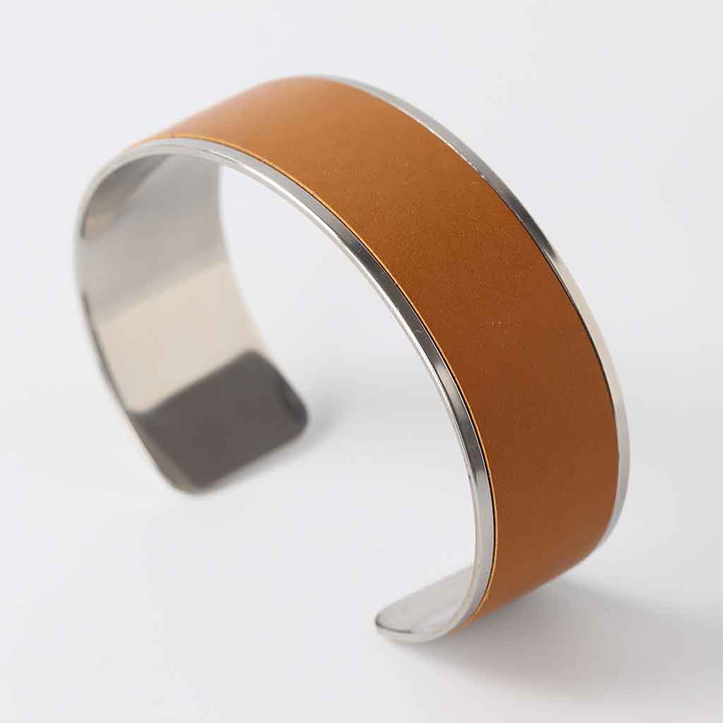 women's cuff bracelet with tan leather on polished stainless steel for silver look
