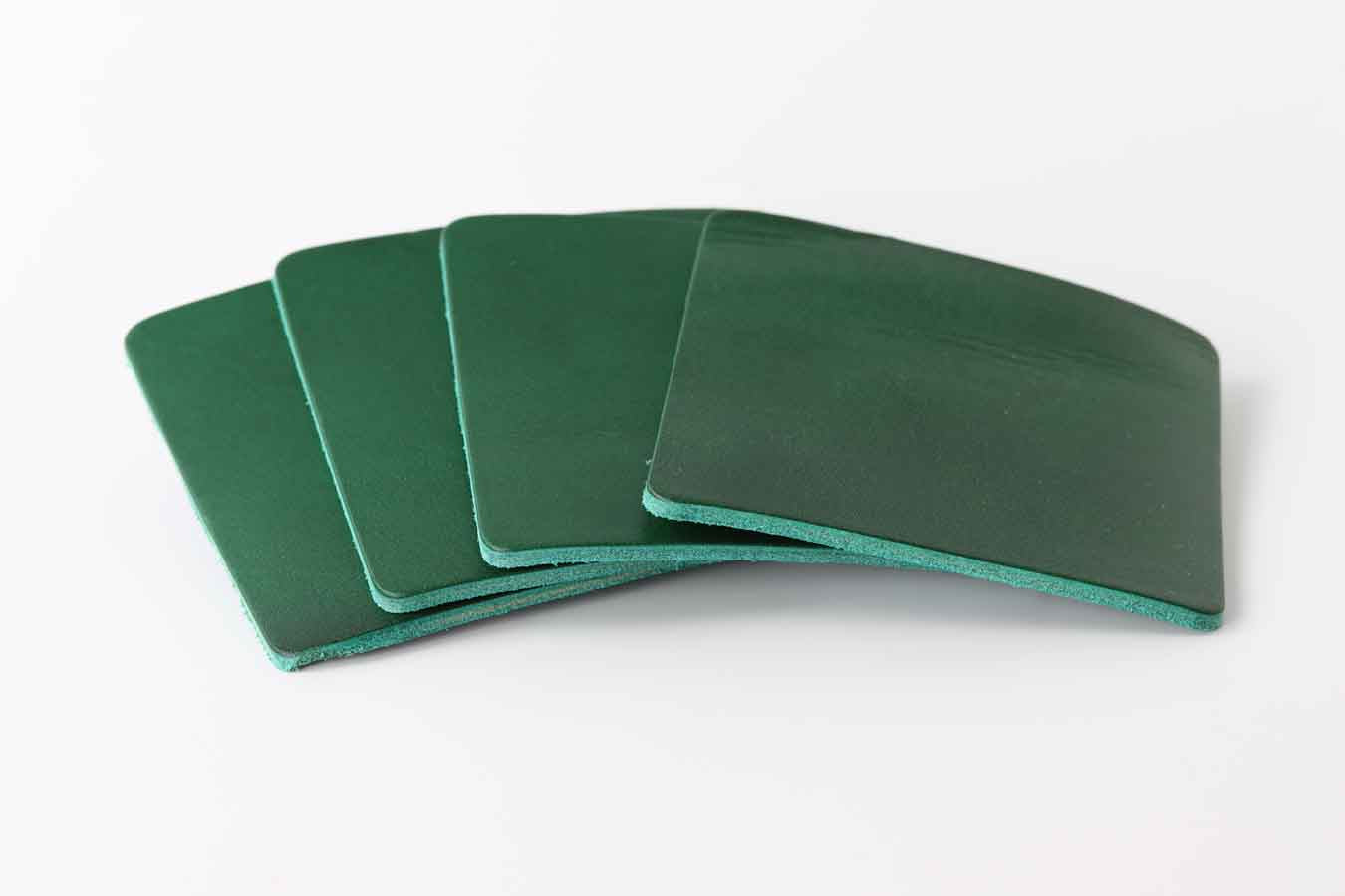 green leather coaster set