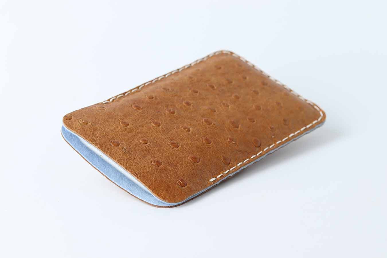iPhone 15 ostrich leather sleeve with white stitching