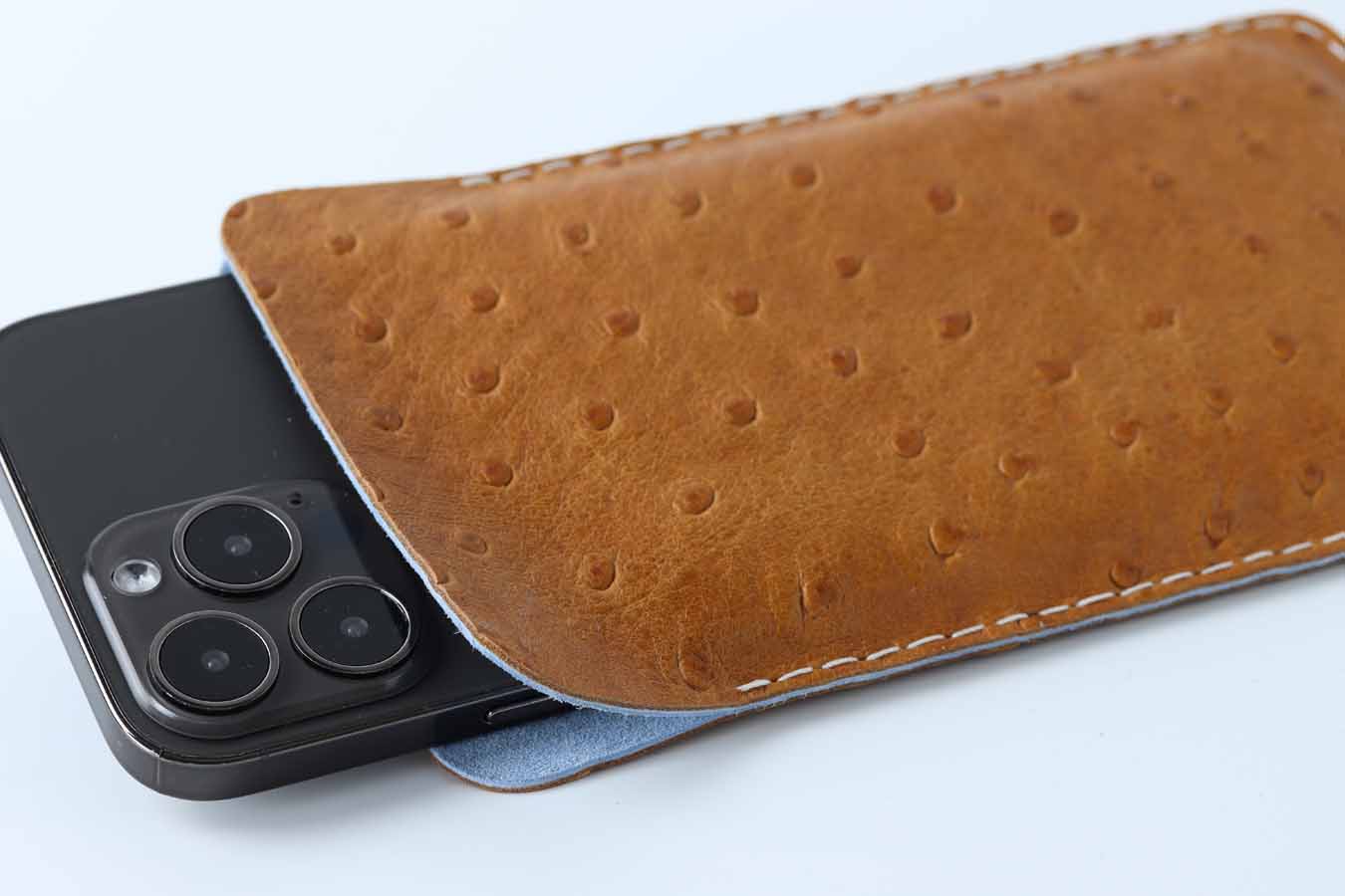 Tan leather sleeve for iPhone 15 Pro