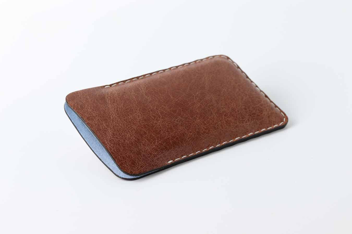 Brown leather iPhone sleeve for protection  with  soft lining inside