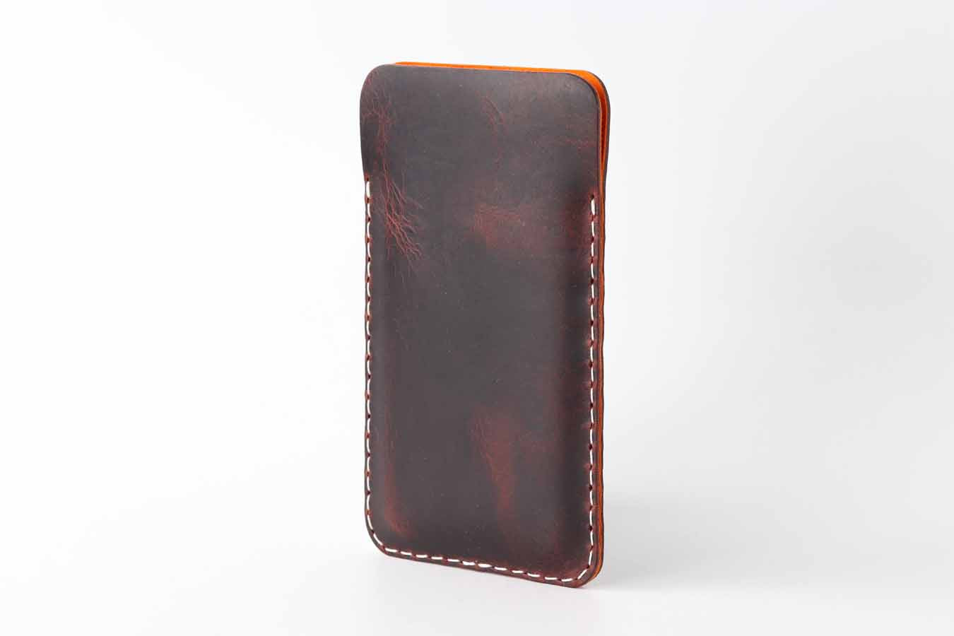 Kaseta iPhone 15 pro Max leather sleeve in chocolate with orange lining suede