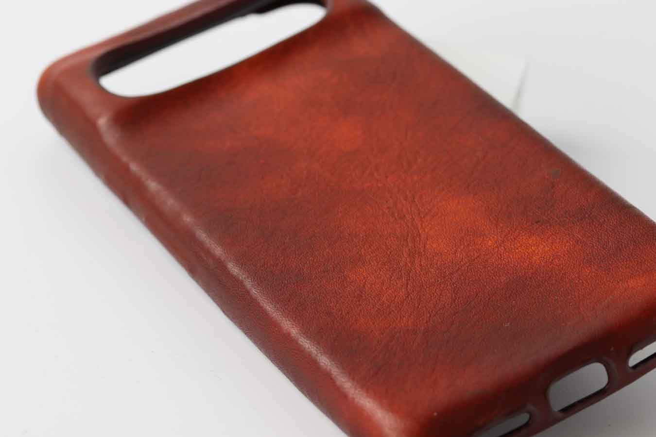 close up of patina looking leather phone case  for pixel 8 and pixel 8 pro