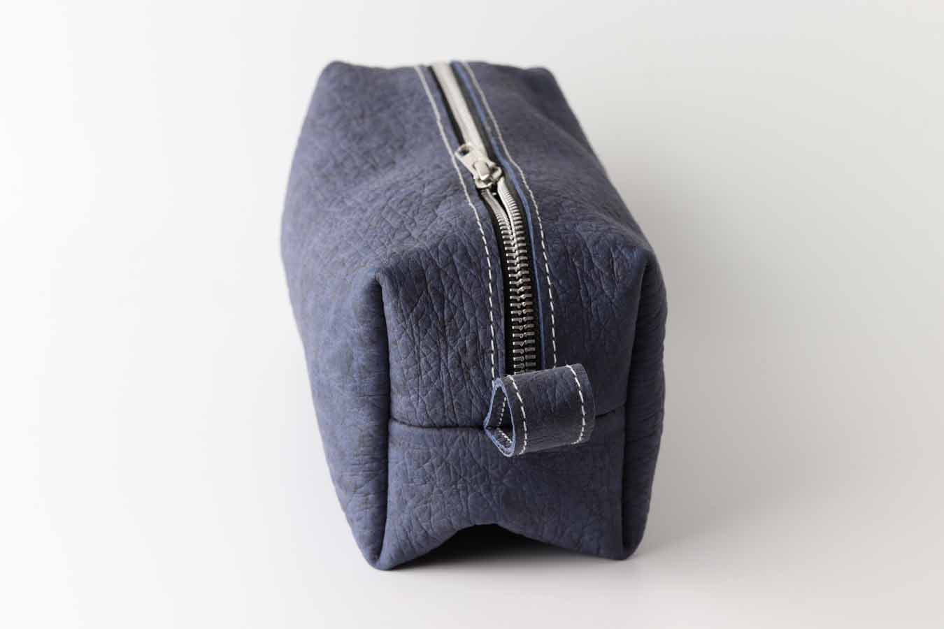 blue cosmetic travel bag with zipper