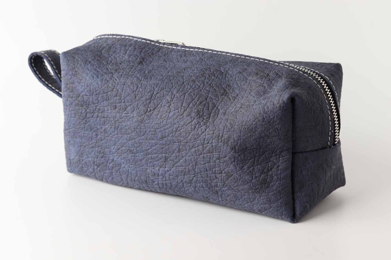 blue leather toiletry bag