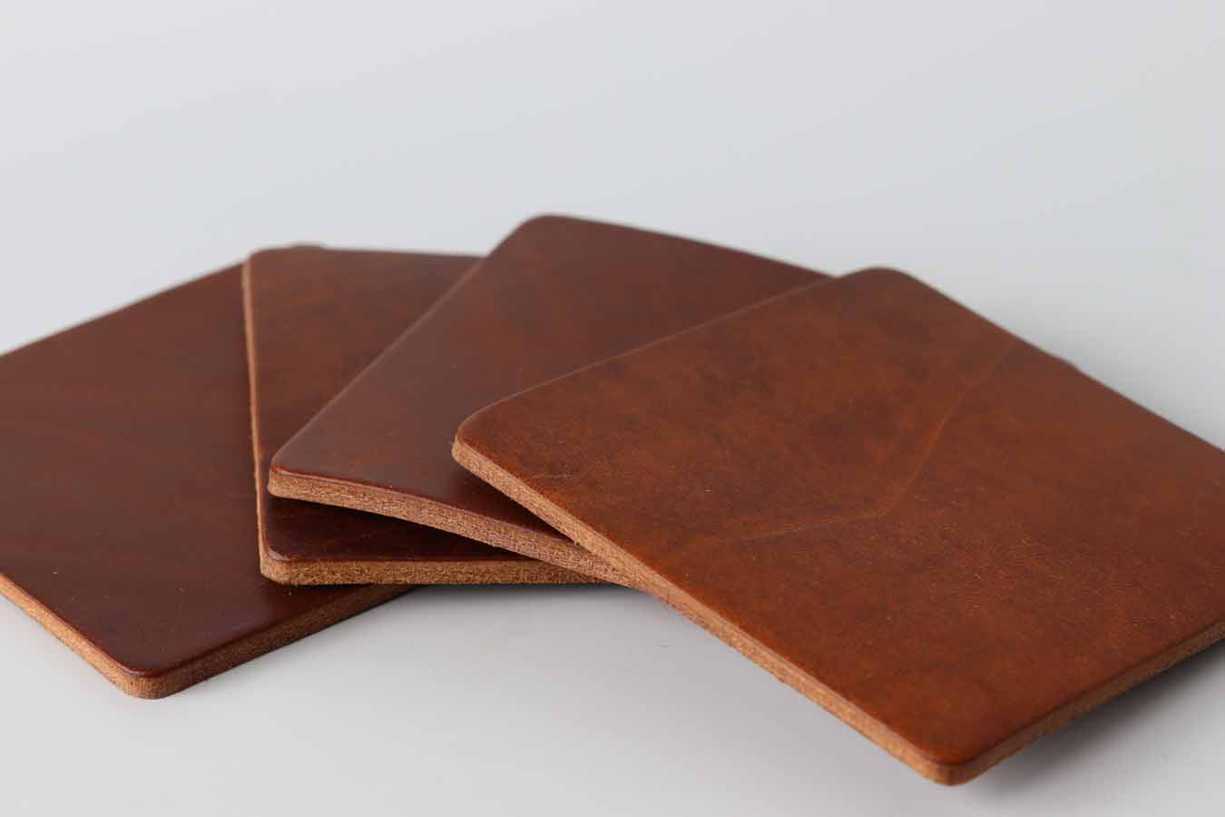 Brown leather coasters by kaseta