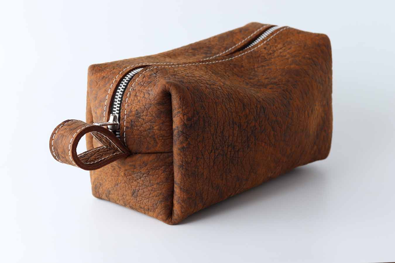 brown leather ditty bag with zipper