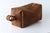 brown leather ditty bag with zipper